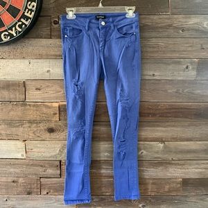 Blue BEBE ripped jeans